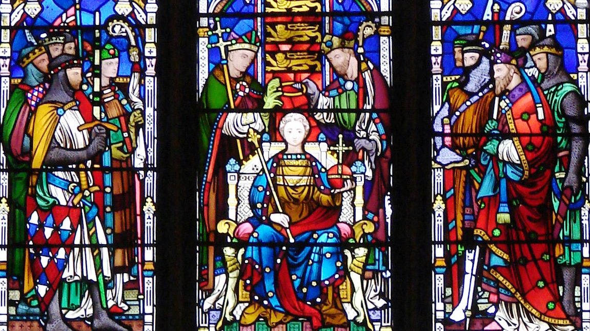 A stained glass window at Gloucester Cathedral depicting the coronation Of Henry III